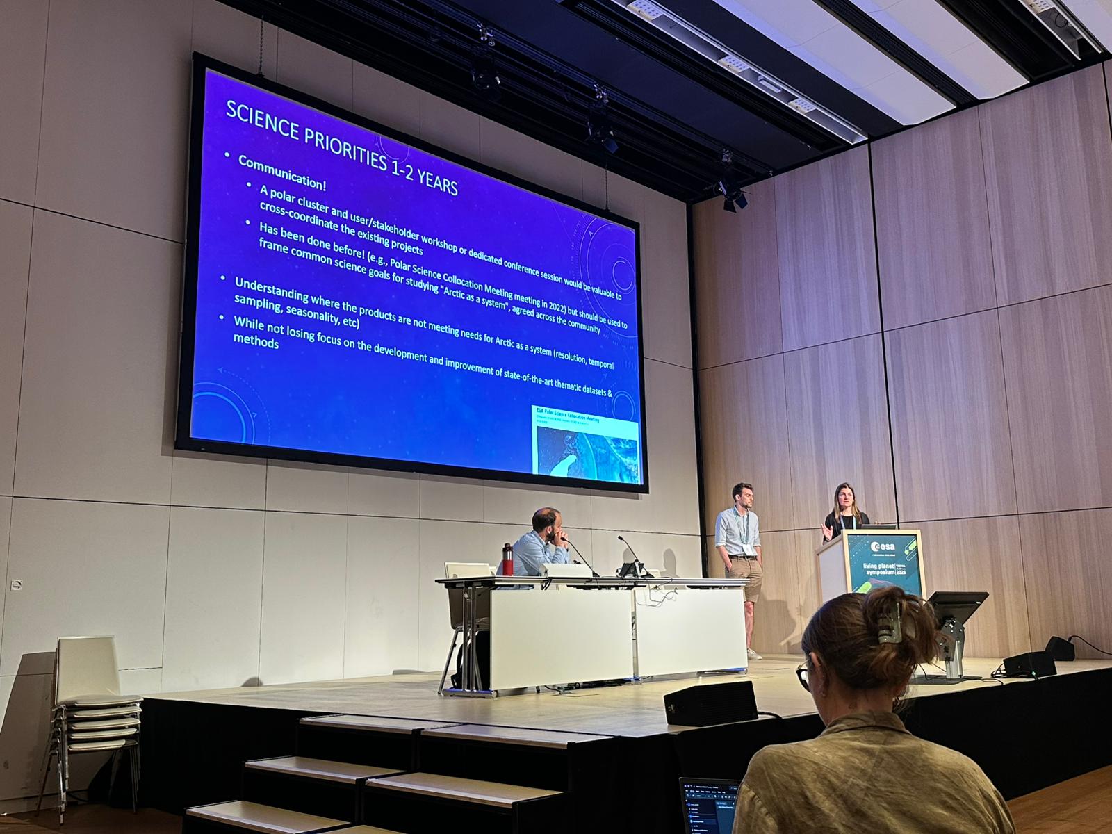 Photo of presentation by Lousie Sandberg Sørensen (DTU Space) and Jack Landy (UiT) of the science priorities and goals for viewing the Arctic as a system.